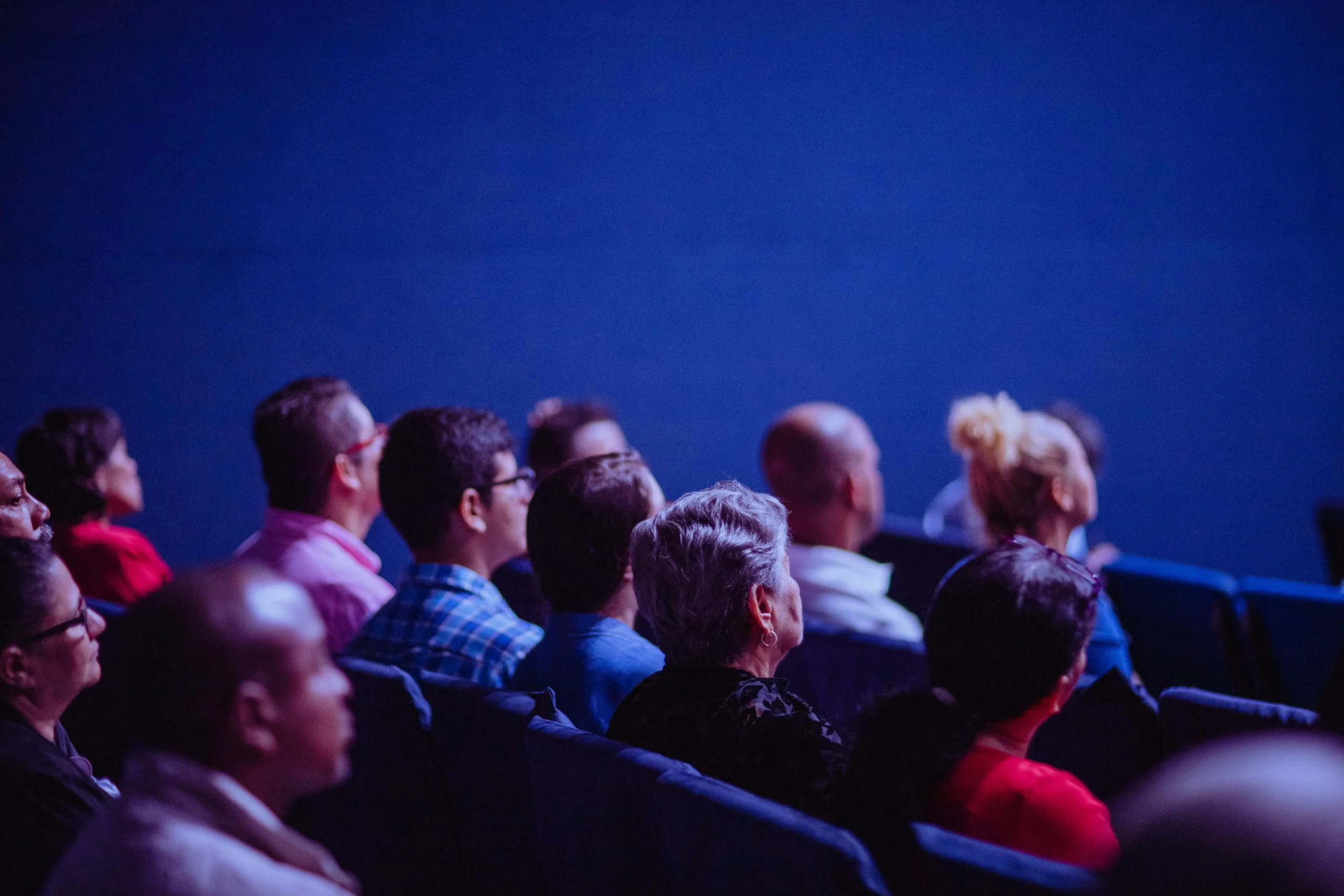 group of speakers at a conference